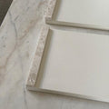 Off white leather & beige marble sides